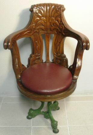 Swivel-chair in mahogany with cast-metal base. Leather seat. Late 19th century.